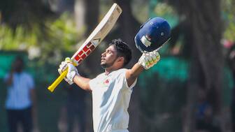 Musheer Khan celebrates after completing his century in Mumbai's Ranji Trophy quarter-final meeting with Baroda in Mumbai. PTI