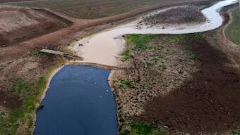 Oil slicks blamed on Turkish strikes blight northeast Syria river