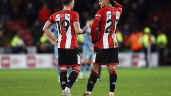 Sheffield United's Jack Robinson (L) and Vinicius Souza in the Premier League. AFP