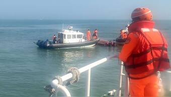 (File) In this handout photograph provided by Taiwan Coast Guard Administration, Taiwanese coast guards inspect a vessel that capsized during a chase off the coast of Kinmen archipelago in Taiwan, on 14 February, 2024. The unnamed vessel had been sailing about one nautical mile off the coast of an islet of Kinmen island and was trespassing, said Taiwan’s Coast Guard Administration. AP