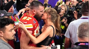 Watch: Taylor Swift embraces Travis Kelce on the field after Super Bowl win