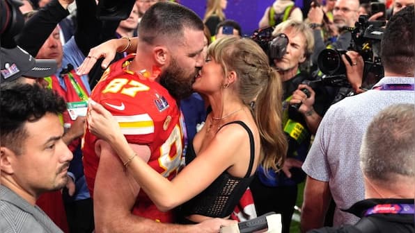 Watch: Taylor Swift embraces Travis Kelce on the field after Super Bowl win