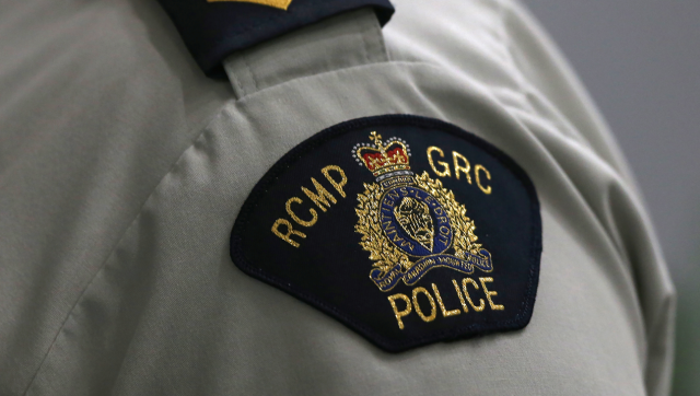 Canada's police officer held over information leak to foreign government Canada's police officer held over information leak to foreign government
