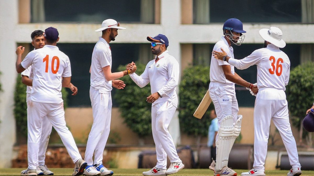 Players of Vidarbha and Karnataka greet each other at the end of their Ranji Trophy quarter-final match, in Nagpur. PTI Players of Vidarbha and Karnataka greet each other at the end of their Ranji Trophy quarter-final match, in Nagpur. PTI
