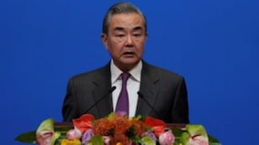 Australia invites China's Wang Yi to visit next month in latest sign of thawing relations