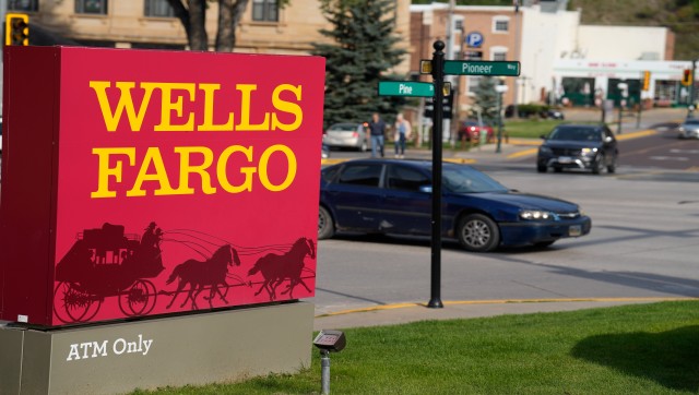 US eases restrictions on Wells Fargo after years of strict oversight following scandal US eases restrictions on Wells Fargo after years of strict oversight following scandal