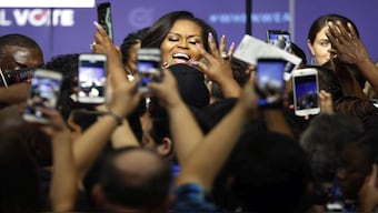 A new survey has shown that former US First Lady Michelle Obama is the top contender to replace Joe Biden. File image/AP