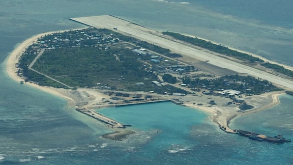 Why does India want to contain China in the South China Sea?