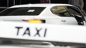 Why is Uber paying $178 million to Australian taxi drivers?