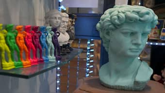 Souvenirs of Michelangelo's 16th- century statue of David are seen on sale among other souvenirs in a shop in downtown Florence, central Italy. AP