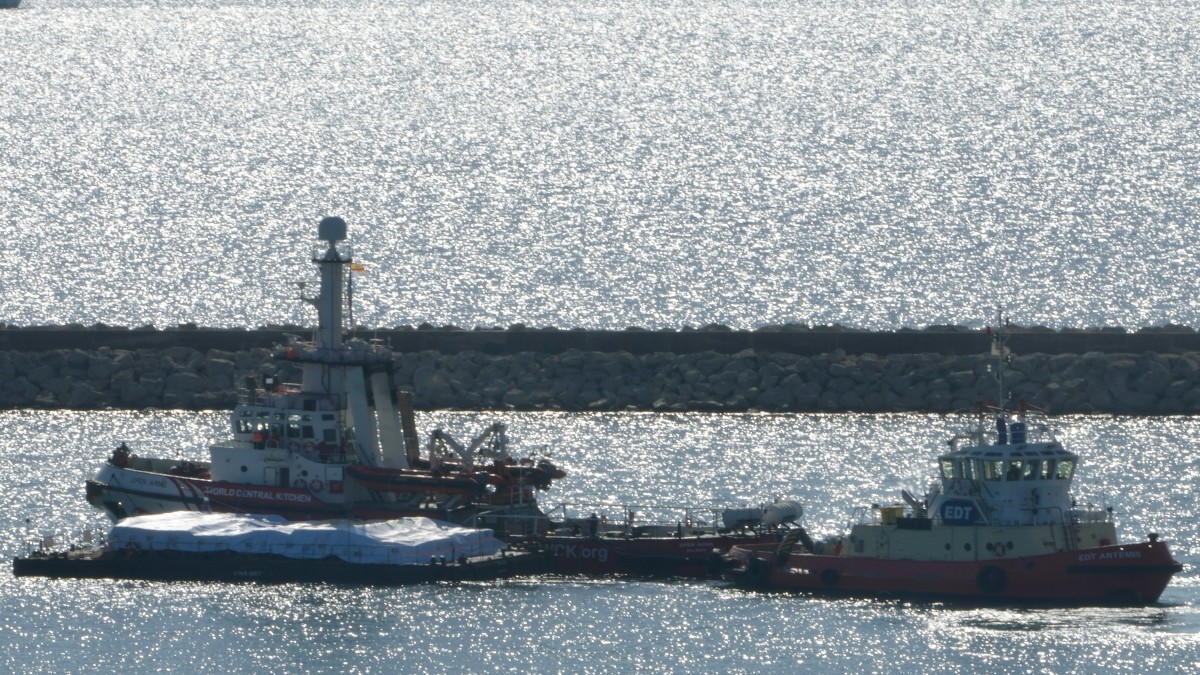 The ship, left, belonging to the Open Arms aid group with aid on a platform ferry some 200 tonnes of rice and flour directly to Gaza, departs from the port from southern city of Larnaca, Cyprus. AP The ship, left, belonging to the Open Arms aid group with aid on a platform ferry some 200 tonnes of rice and flour directly to Gaza, departs from the port from southern city of Larnaca, Cyprus. AP