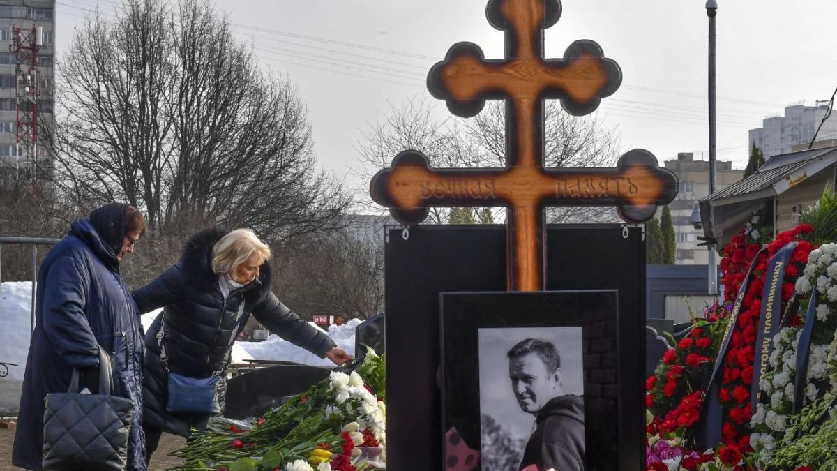 Navalny’s mother brings flowers to his grave a day after thousands attended his funeral in Moscow Navalny’s mother brings flowers to his grave a day after thousands attended his funeral in Moscow