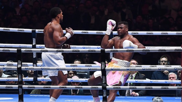 Anthony Joshua outpunches MMA star Francis Ngannou with brutal second-round knockout