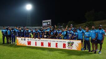 Sri Lanka players with the T20I series trophy after beating Bangladesh. SLC image