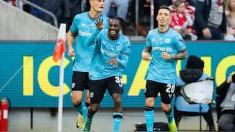 Bayer Leverkusen's Jeremie Frimpong (C) celebrates after scoring against Cologne in the Bundesliga. AP