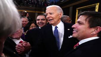 President Joe Biden, center, departs after delivering the State of the Union address to a joint session of Congress at the Capitol in Washington on Thursday. AP