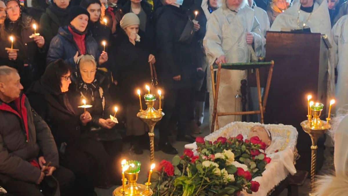 In this photo released by Navalny Team, relatives and friends pay their last respects at the coffin of Russian opposition leader Alexei Navalny in the Church of the Icon of the Mother of God Soothe My Sorrows, in Moscow, Russia, Friday, March 1, 2024. 