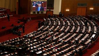 Chinese President Xi Jinping is displayed on a big screen during the closing session of the Chinese People's Political Consultative Conference (CPPCC) held in the Great Hall of the People in Beijing, in Beijing. AP