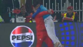 Colin Munro hugged a ball boy on the boundary rope after he plucked a stunning diving catch in Pakistan Super League. Image: X/PSL