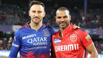 RCB vs PBKS IPL 2024 LIVE: Royal Challengers Bengaluru captain Faf du Plessis with Punjab Kings counterpart Shikhar Dhawan at the toss during Match 6 of IPL 2024 in Bengaluru's M Chinnaswamy Stadium. Sportzpics