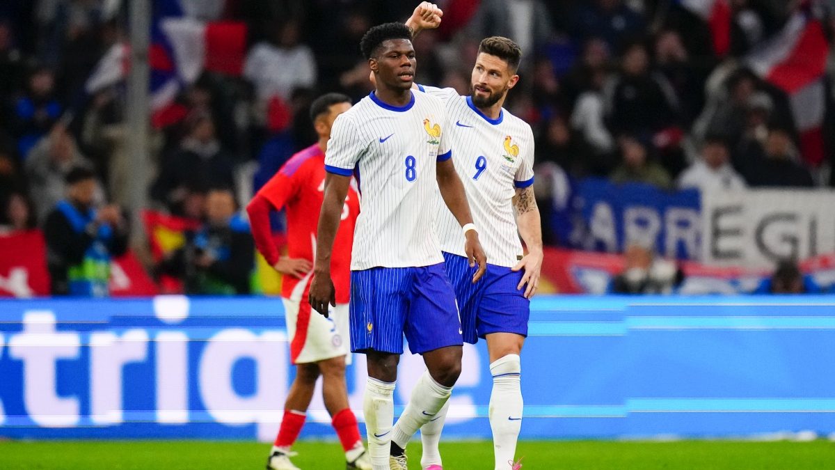 Olivier Giroud (R) celebrates after scoring France's third goal during an international friendly against Chile. AP Olivier Giroud (R) celebrates after scoring France's third goal during an international friendly against Chile. AP