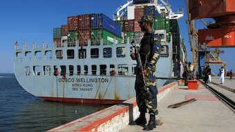 (File) A Pakistan Navy soldier stands guard while a loaded Chinese ship is readied for departure prior to a ceremony at Gwadar port, about 435 miles, 700 km, west of Karachi. on 13 November, 2016. AP