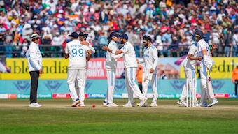 Indian cricket team celebrates after beating England in Dharamsala. PTI