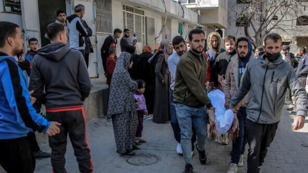 Israel conducts probe, claims Palestinians gunmen fired on Gaza crowd awaiting aid Israel conducts probe, claims Palestinians gunmen fired on Gaza crowd awaiting aid