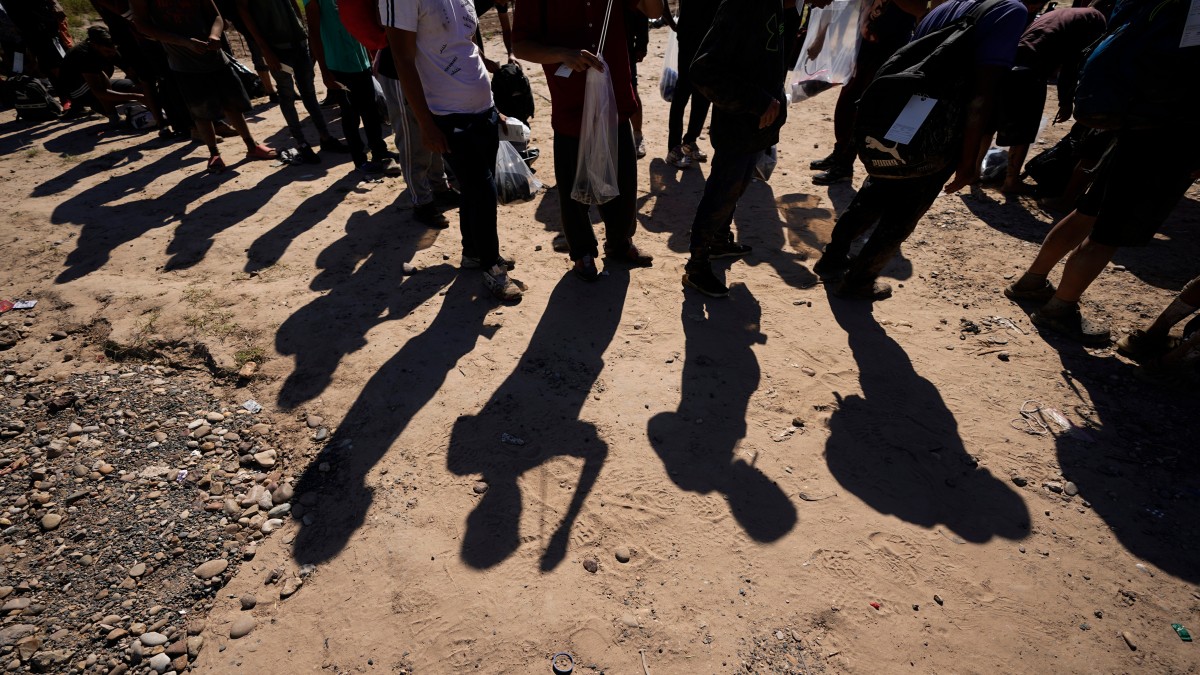 Migrants wait to be processed by the U.S. Customs and Border Patrol after they crossed the Rio Grande and entered the U.S. from Mexico, in Eagle Pass, Texas. AP File Migrants wait to be processed by the U.S. Customs and Border Patrol after they crossed the Rio Grande and entered the U.S. from Mexico, in Eagle Pass, Texas. AP File