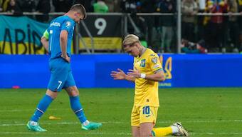 Mykhailo Mudryk (R) scored the winner for Ukraine as they came from behind to beat Iceland in Euro 2024 playoffs. AP