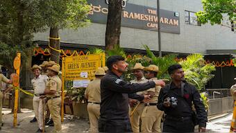 Security personnel stand guard at the Rameshwaram cafe blast site, in Bengaluru. PTI