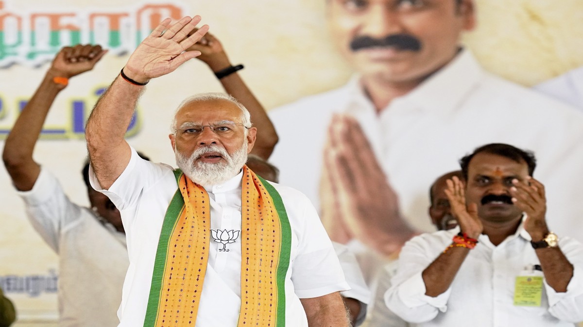 Prime Minister Narendra Modi waves to supporters during a public meeting, ahead of the Lok Sabha election, in Kanyakumari. PTI Prime Minister Narendra Modi waves to supporters during a public meeting, ahead of the Lok Sabha election, in Kanyakumari. PTI