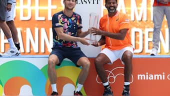 Matthew Ebden (L) and Rohan Bopanna (R) after winning the Miami Open title. AFP/Getty Images