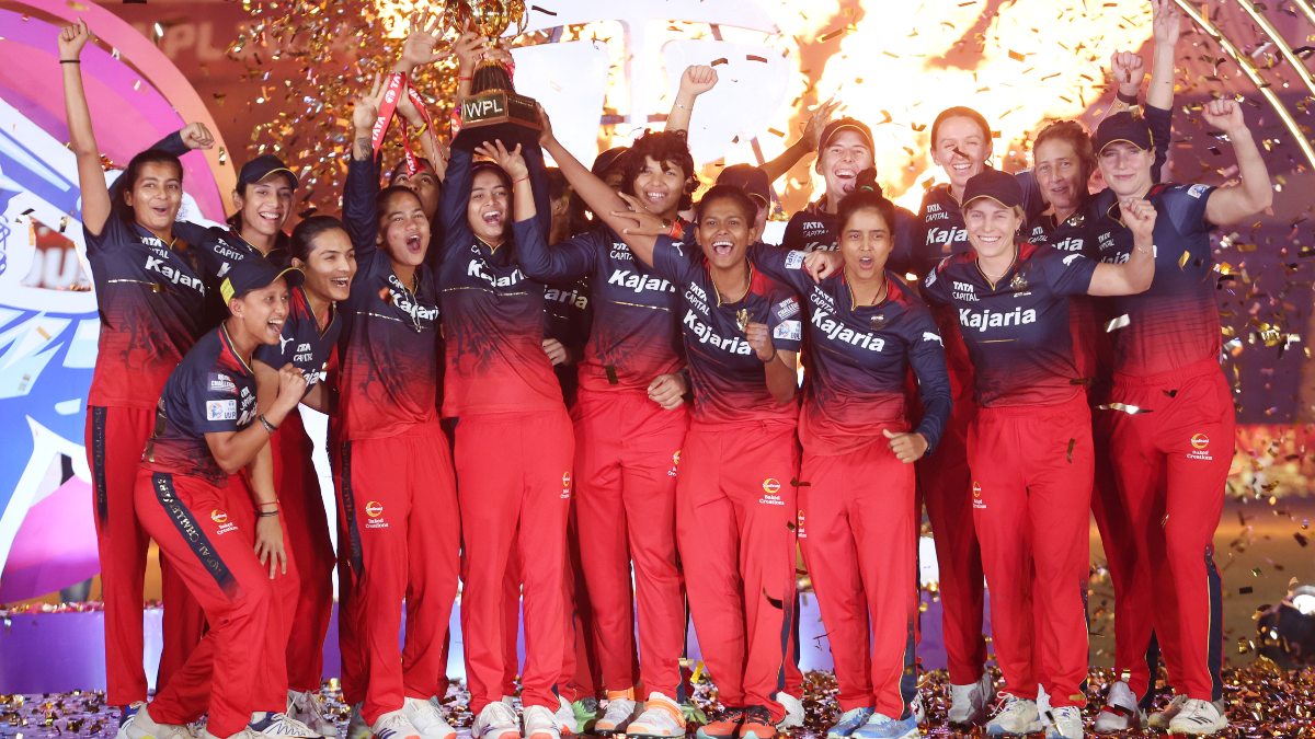The Royal Challengers Bangalore players celebrate with the trophy after defeating Delhi Capitals to be crowned WPL 2024 champions. Sportzpics The Royal Challengers Bangalore players celebrate with the trophy after defeating Delhi Capitals to be crowned WPL 2024 champions. Sportzpics