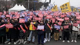 Doctors stage a rally against the government's medical policy in Seoul, South Korea. AP