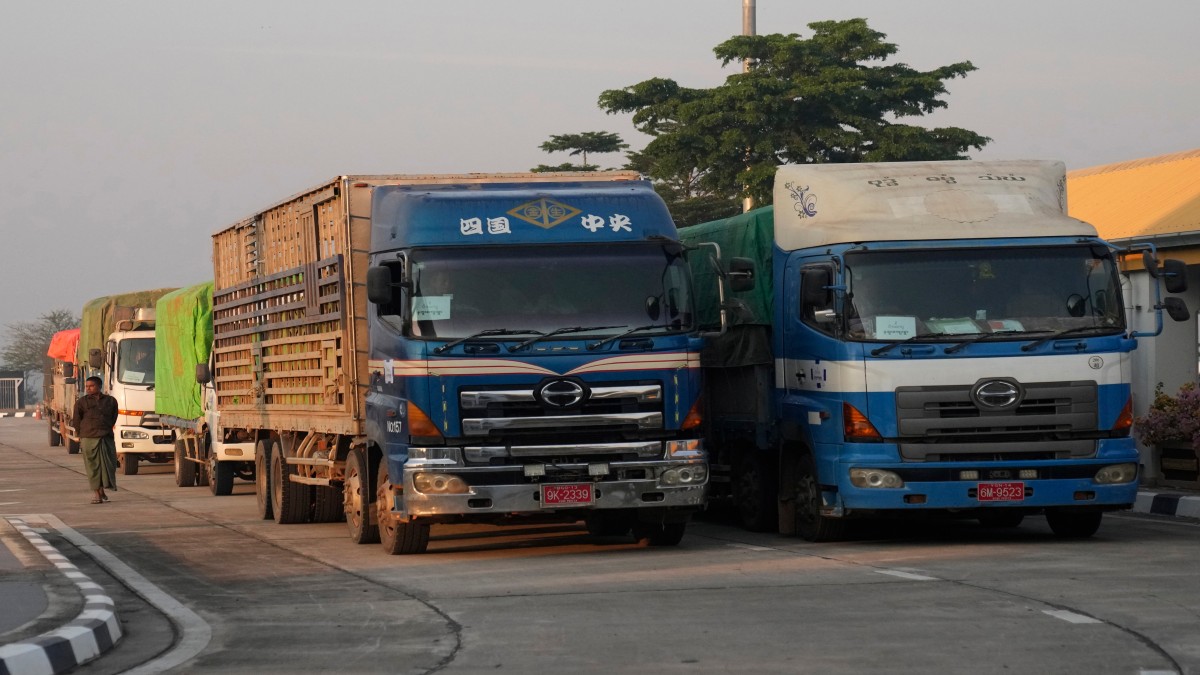 A Myanmar’s truck driver walks by his truck carrying aid before they leave the customs checkpoint near the border with Myanmar, in Mae Sot, Tak province Thailand. AP A Myanmar’s truck driver walks by his truck carrying aid before they leave the customs checkpoint near the border with Myanmar, in Mae Sot, Tak province Thailand. AP