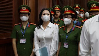 Vietnamese real estate tycoon Truong My Lan, front centre, is escorted into a courtroom in Ho Chi Minh city, Vietnam, on 5 March, 2024. AP