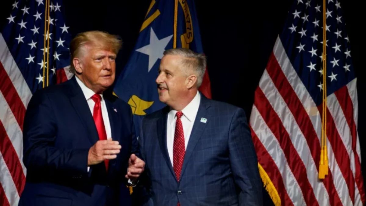 Former US President Donald Trump with his choice to lead the Republican National Committee, Michael Whatley. AFP Former US President Donald Trump with his choice to lead the Republican National Committee, Michael Whatley. AFP