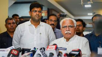 Manohar Lal Khattar and JJP chief Dushyant Chautala. PTI file