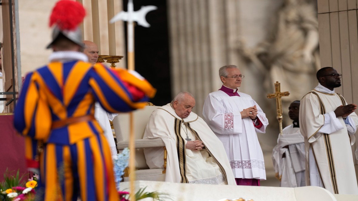 Pope overcomes health concerns to preside over a blustery Easter Sunday Mass in St. Peter's Square Pope overcomes health concerns to preside over a blustery Easter Sunday Mass in St. Peter's Square