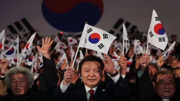 South Korea's Yoon says better Japan ties helping deter North Korea threat, seeks international help for reunification with North