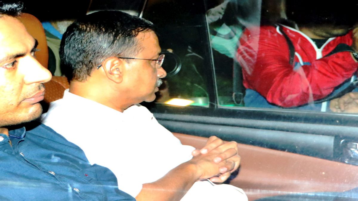 Delhi chief minister Arvind Kejriwal being taken to the Enforcement Directorate office in the excise policy-linked money laundering case, in New Delhi. PTI Delhi chief minister Arvind Kejriwal being taken to the Enforcement Directorate office in the excise policy-linked money laundering case, in New Delhi. PTI
