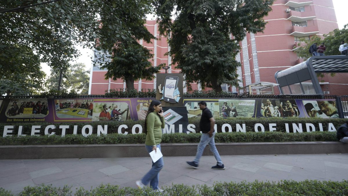 People walk past the Election Commission of India (ECI) premises, in New Delhi. On 16 March (Saturday), the poll body will announced the dates for the upcoming Lok Sabha polls. File image/PTI People walk past the Election Commission of India (ECI) premises, in New Delhi. On 16 March (Saturday), the poll body will announced the dates for the upcoming Lok Sabha polls. File image/PTI