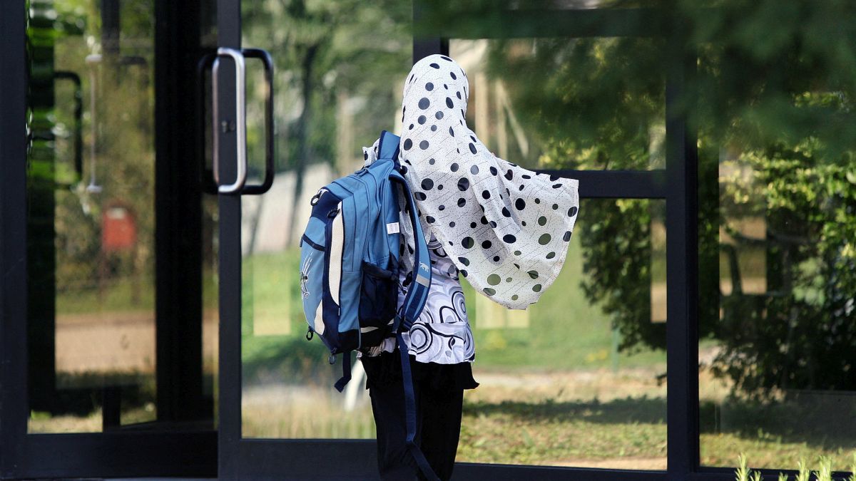 France is all set to file a complaint against a student over falsely accusing a school principal of mistreating her for wearing a headscarf. Representational picture/AFP France is all set to file a complaint against a student over falsely accusing a school principal of mistreating her for wearing a headscarf. Representational picture/AFP