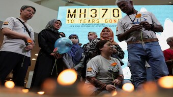 Families of passengers from both China and Malaysia, who were aboard the missing Malaysia Airlines flight MH370, are seen during a remembrance event commemorating the 10th anniversary of its disappearance, in Subang Jaya, Malaysia. Reuters