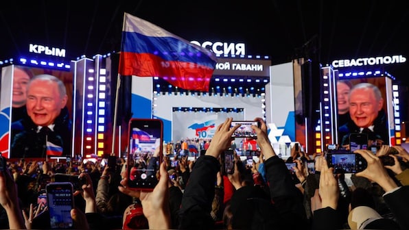 Putin says Crimea 'returned home' after Russia's invasion, announces new rail route via Ukraine