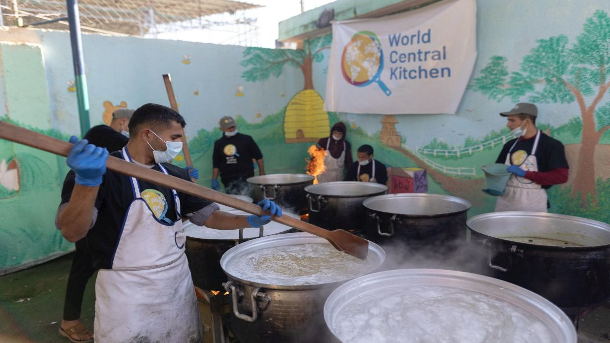 Members of "World Central Kitchen" prepare food for Palestinians, in the location given as Gaza, amid the ongoing conflict between Israel and Hamas. Reuters  Members of "World Central Kitchen" prepare food for Palestinians, in the location given as Gaza, amid the ongoing conflict between Israel and Hamas. Reuters