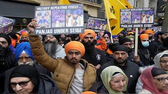 Protestors demonstrate outside of the Indian High Commission in London, Wednesday, 22 March 2023. AP