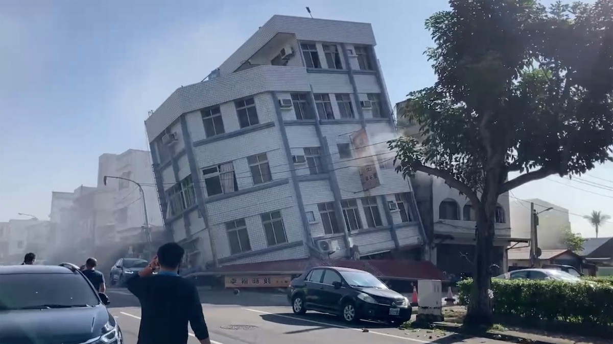 In this image taken from a video footage run by TVBS, a partially collapsed building is seen in Hualien, eastern Taiwan on Wednesday, 3 April 2024. AP In this image taken from a video footage run by TVBS, a partially collapsed building is seen in Hualien, eastern Taiwan on Wednesday, 3 April 2024. AP