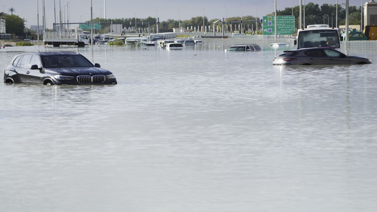Vehicles sit abandoned in floodwater covering a major road in Dubai, United Arab Emirates. AP Vehicles sit abandoned in floodwater covering a major road in Dubai, United Arab Emirates. AP